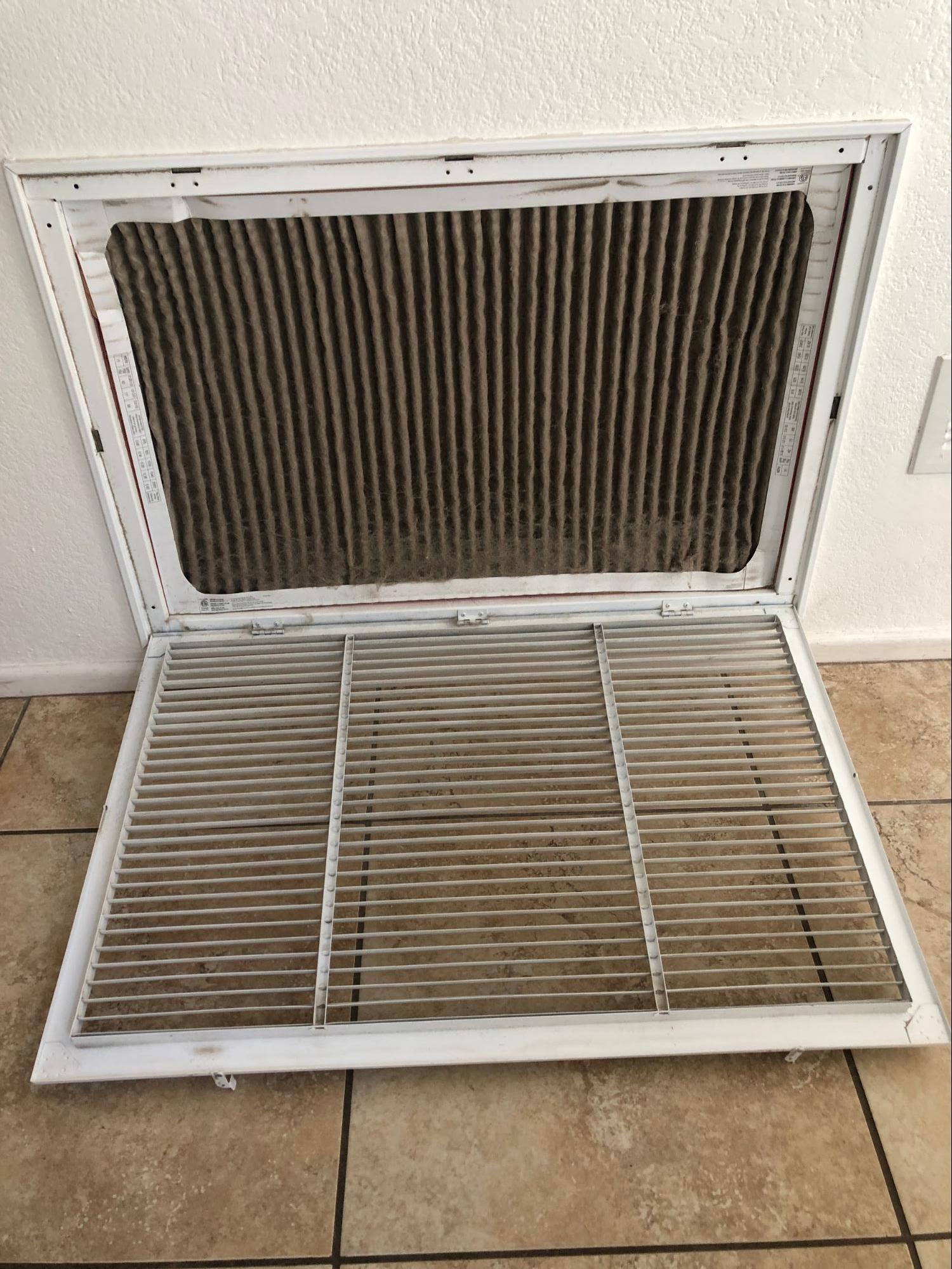 dirty filter inside of an open vent