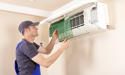technician working on ductless unit
